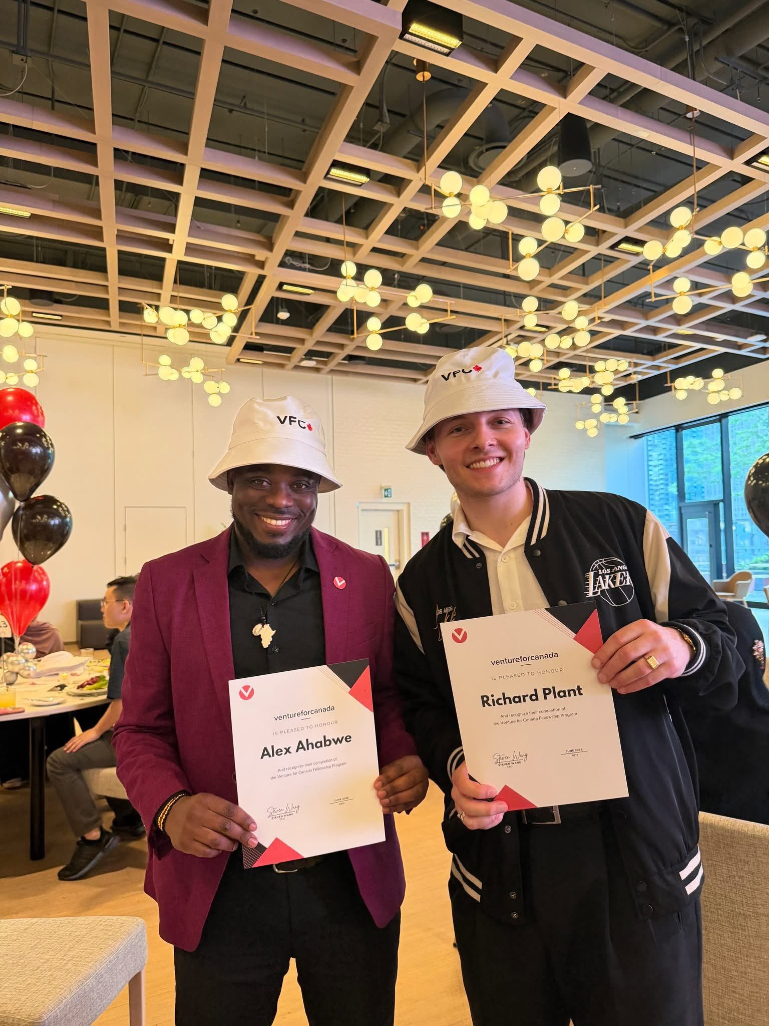Alex Ahabwe at a Venture for Canada recognition event